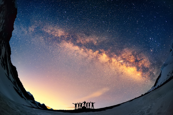 People looking up in the night sky Stock Photo