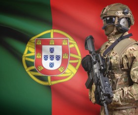 Portuguese flag with heavily armed soldiers HD picture