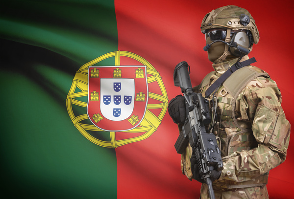 Portuguese flag with heavily armed soldiers HD picture
