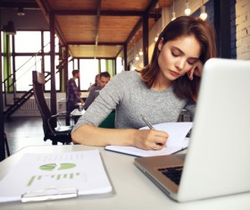 Record notes of working women Stock Photo