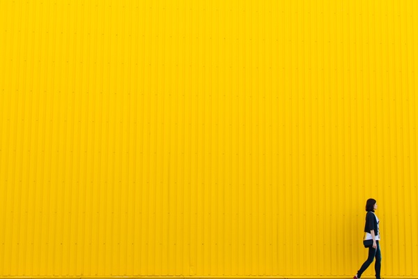 People with yellow walls Stock Photo