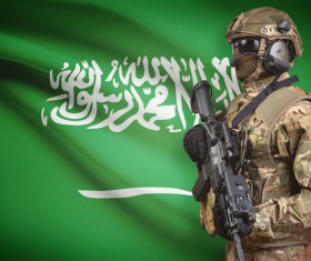 Saudi flag with heavily armed soldiers HD picture