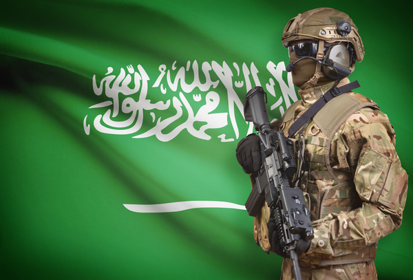 Saudi flag with heavily armed soldiers HD picture