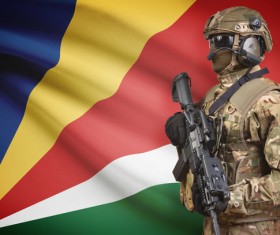 Seychelles flag with heavily armed soldiers HD picture