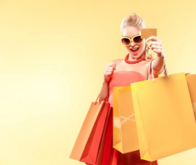 Shopping woman with bank card HD picture