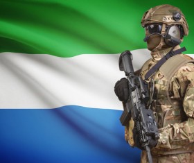 Sierra Leone flag with heavily armed soldiers HD picture