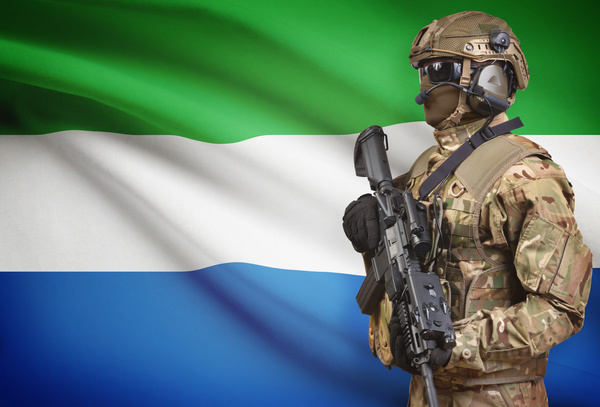 Sierra Leone flag with heavily armed soldiers HD picture
