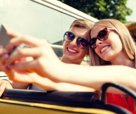 Smiling couple self-timer Stock Photo
