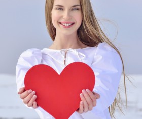 Smiling girl heart-shaped Stock Photo