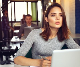 Staring at the front of the work of women Stock Photo