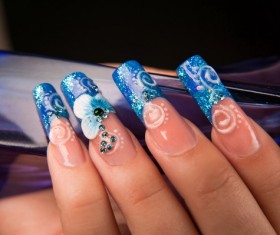 Stylish blue painted nail Stock Photo