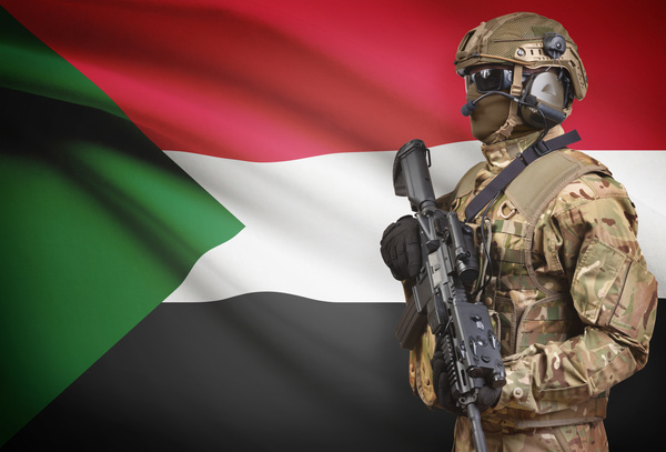 Sudanese flag with heavily armed soldiers HD picture