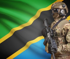 Tanzanian flag with heavily armed soldiers HD picture