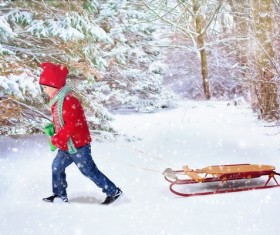 The boy pulled the sledge HD picture