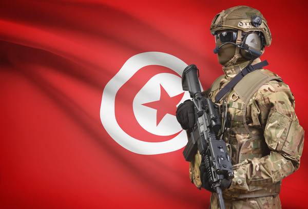 Tunisian flag with heavily armed soldiers HD picture
