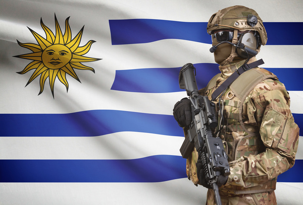 Uruguay national flag with heavily armed soldiers HD picture