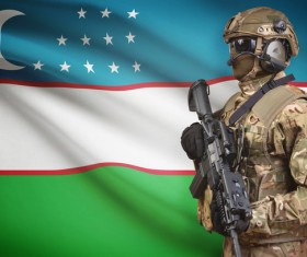 Uzbekistan flag and heavily armed soldiers HD picture
