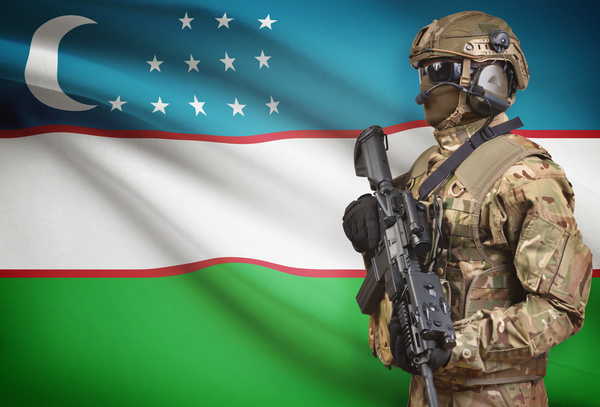 Uzbekistan flag and heavily armed soldiers HD picture