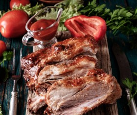 Vegetables with a delicious grilled pork ribs sauce HD picture