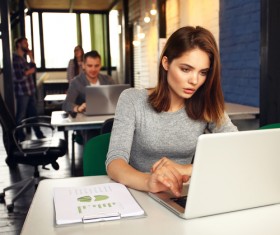 View online information about working women Stock Photo