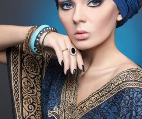 Wearing a folk dress to wear jewelry beautiful women