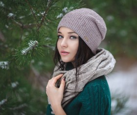 Winter outdoor lovely girl with pine branches Stock Photo 01