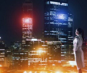 Woman looking at night city stock photo 03