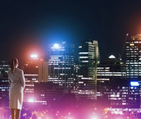 Woman looking at night city stock photo 07
