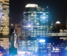Woman looking at night city stock photo 20