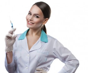 A doctor holding a needle Stock Photo