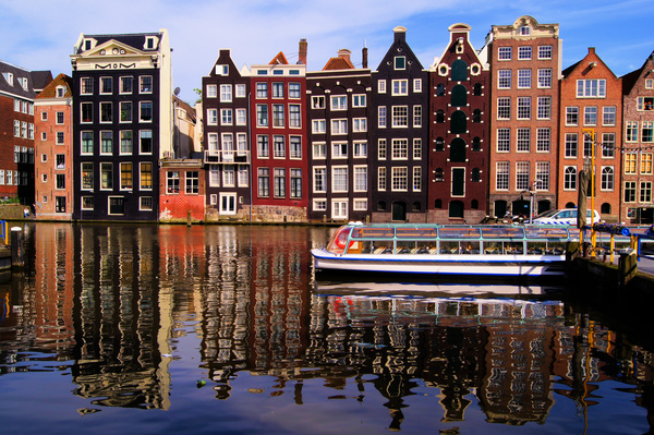 Amsterdam canals and sightseeing boats Stock Photo