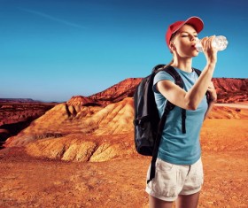 Backpacking girl in travel Stock Photo