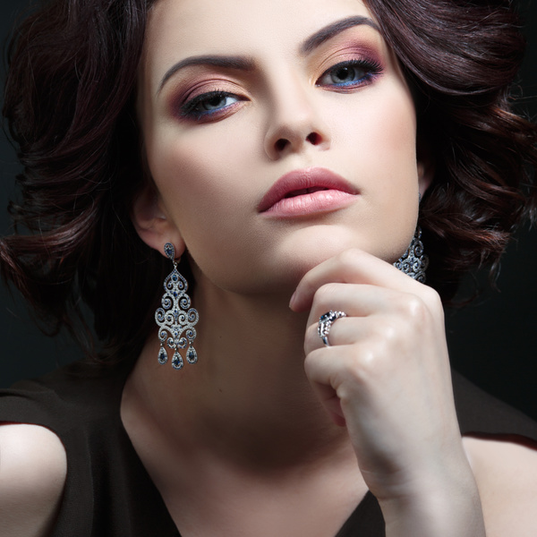 Beautiful makeup and earrings HD picture