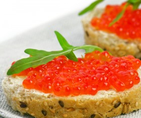 Bread slices with red caviar vegetables Stock Photo