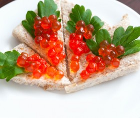Bread with red caviar Stock Photo