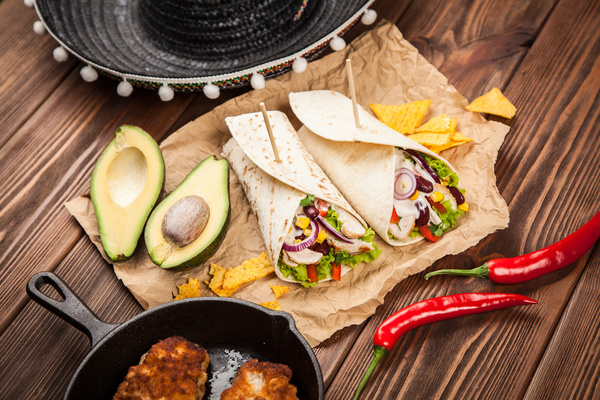 Delicious Mexican burrito with pepper avocado Stock Photo 02