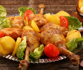 Delicious fried chicken with vegetables Stock Photo