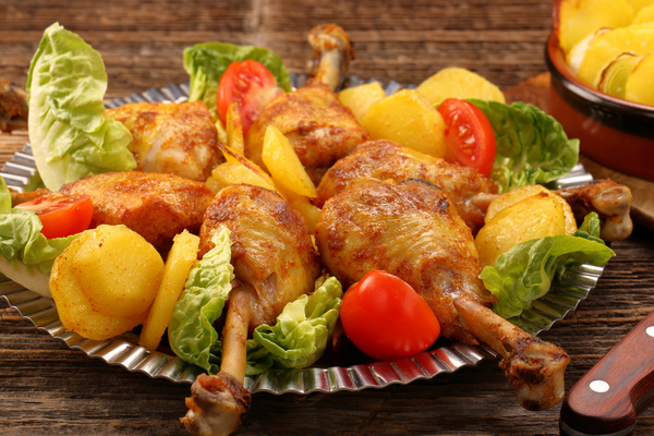 Delicious fried chicken with vegetables Stock Photo