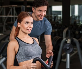 Fitness coach to guide girls fitness movements Stock Photo 07