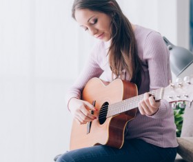 Girl playing guitar HD picture