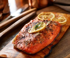 Grilled salmon with lemon slices HD picture
