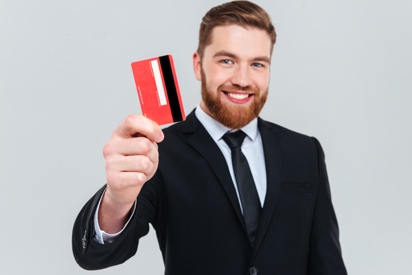 Hand with bank card businessman Stock Photo