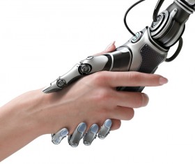 Intelligent robots shake hands with people Stock Photo