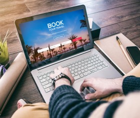 Laptop bookings online Stock Photo
