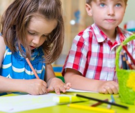 Learning to paint children Stock Photo