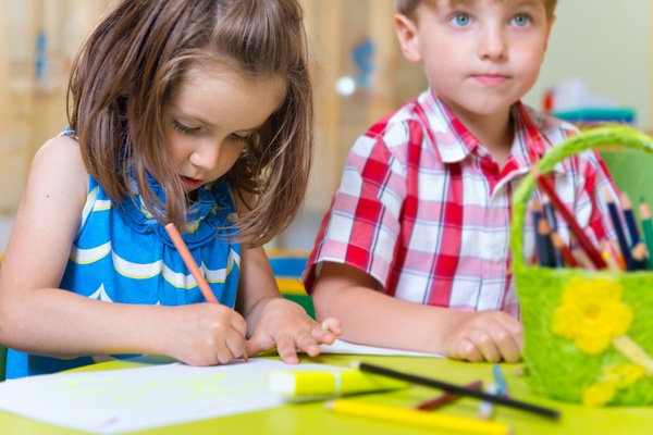 Learning to paint children Stock Photo