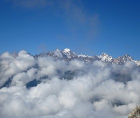 Sea of clouds and snow-capped mountains Stock Photo