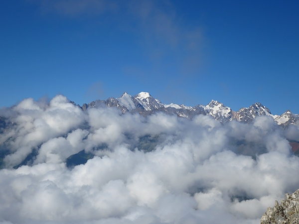 Sea of clouds and snow-capped mountains Stock Photo