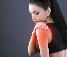 Shoulder pain woman Stock Photo