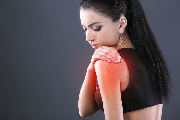 Shoulder pain woman Stock Photo